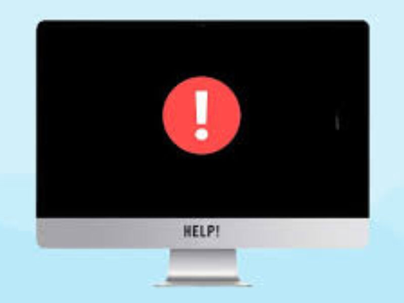 Technician fixing iMac screen black after update issue in a repair shop.