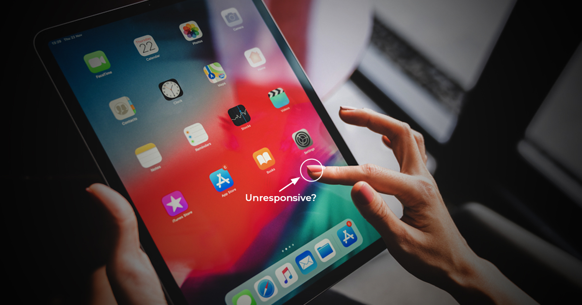 Technician fixing iPad touch screen not responding properly in Dubai