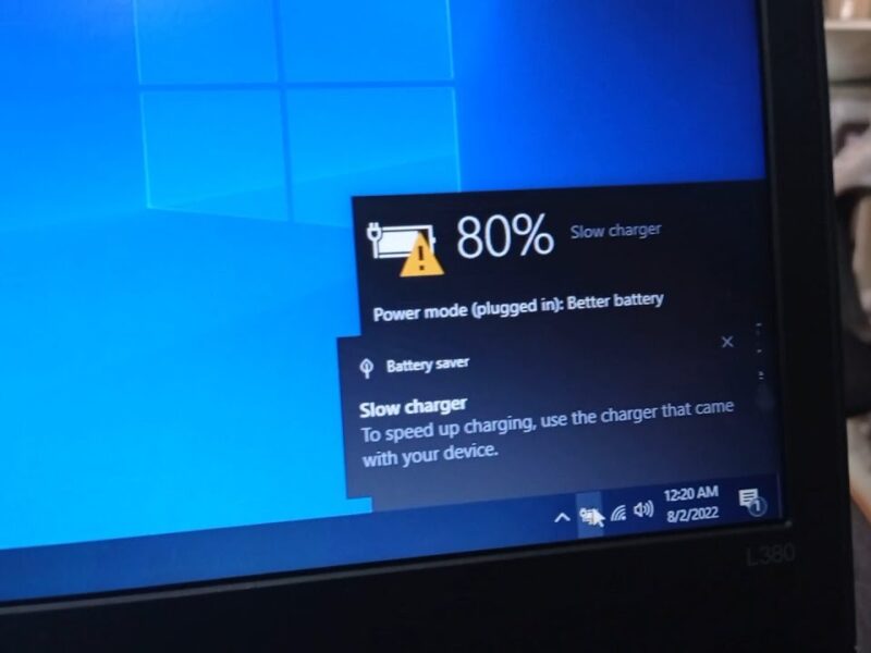 Laptop slow charging issue caused by damaged charging port.