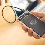 External SSD Repair & Data Retrieval: Secure Your Business Data Technician performing external SSD repair & data retrieval